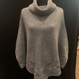 Jperico gray turtleneck poncho. Made in Italy.